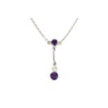 An 18ct white gold, amethyst and diamond necklace, the oval cut amethyst with a single collet set