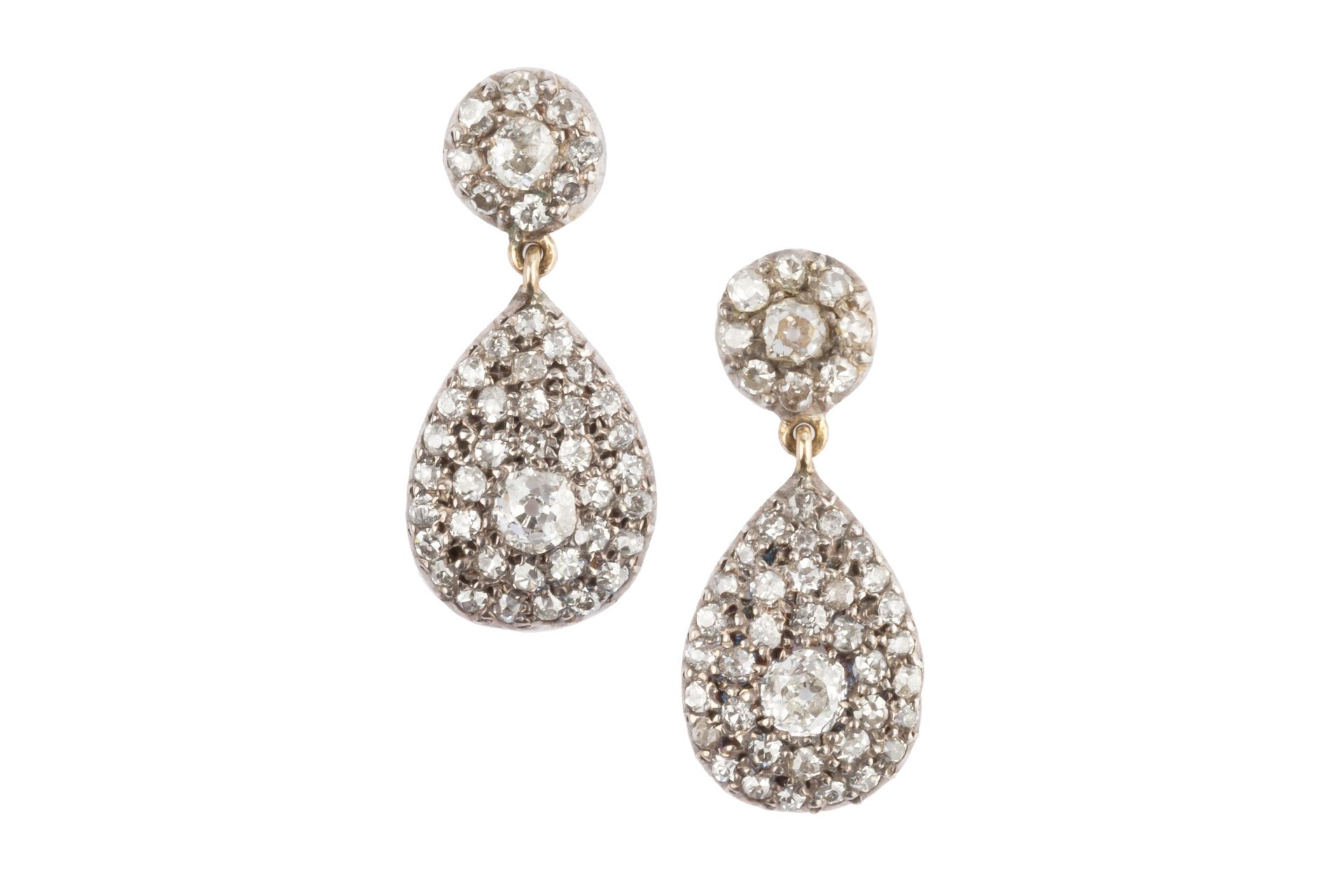 A pair of diamond ear pendants, each designed as a circular cluster of old and single-cut