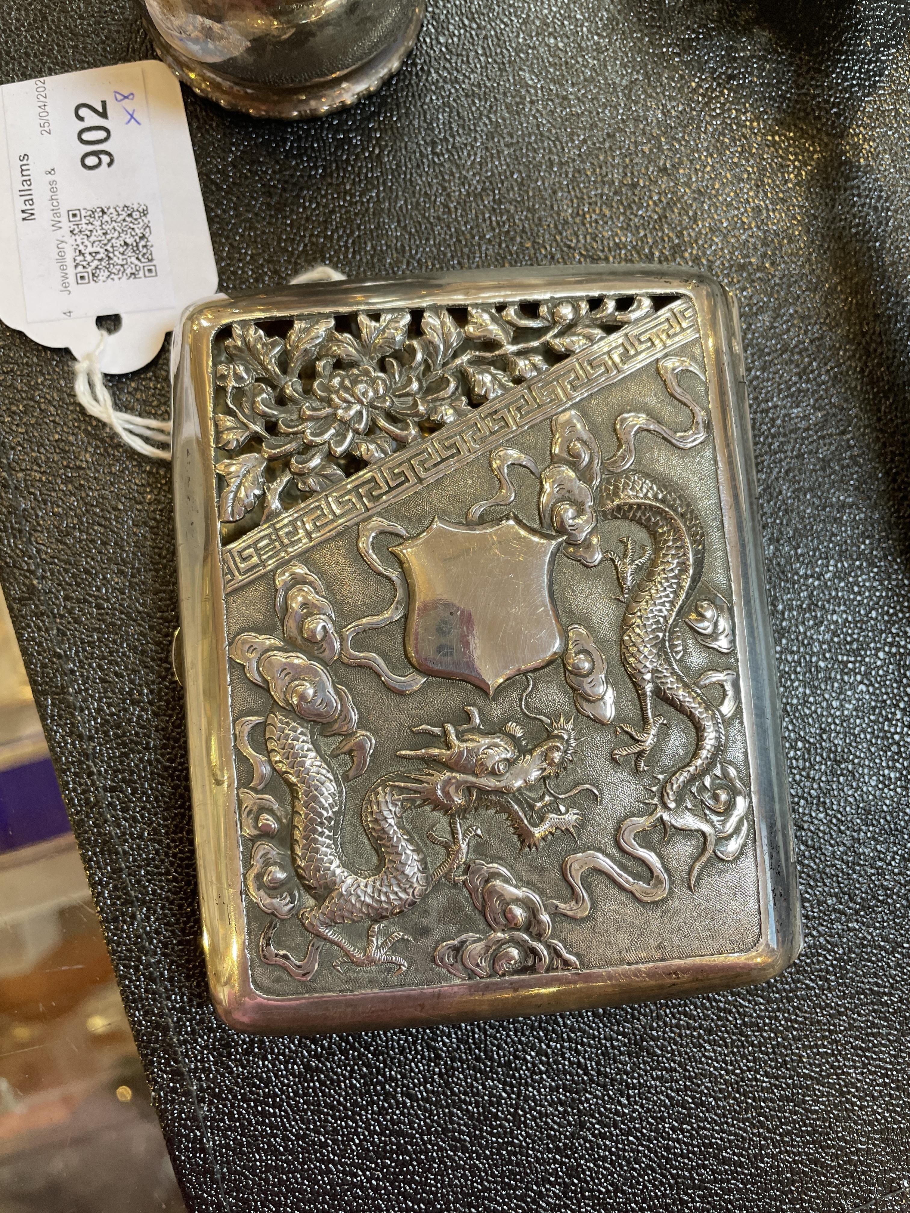 A late 19th century Chinese export silver cigarette case, with embossed and pierced decoration to - Image 12 of 13