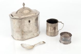 An Edwardian silver tea caddy, of chamfered rectangular form with hinged cover and bright-cut