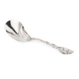 An American silver berry serving spoon by Tiffany, having kidney shaped bowl, and pierced entwined