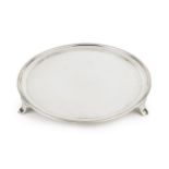 A George III Scottish silver circular small salver, with reeded border, on three plain feet, no