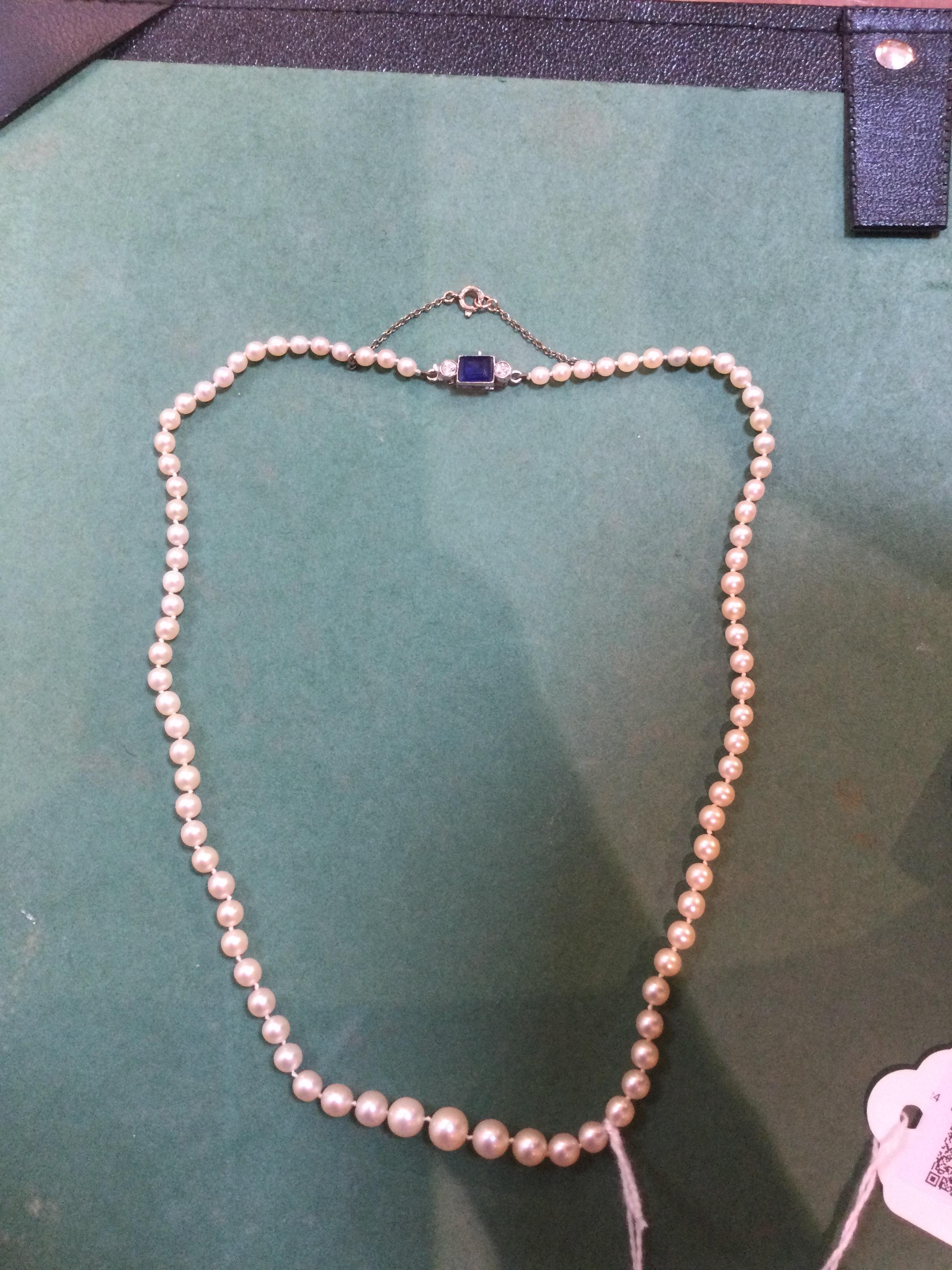 A single strand cultured pearl necklace, having sapphire and diamond set clasp centred with a - Image 5 of 6