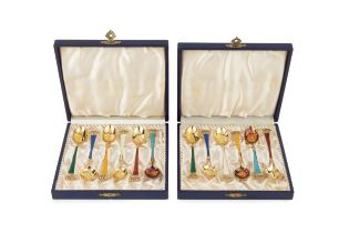 Two sets of six Danish silver-gilt and enamel coffee spoons, with vari-coloured enamel handles and