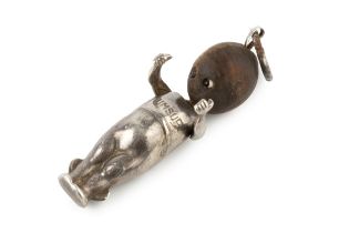 A WWI silver 'Fumsup' mascot doll, with 'touch wood' head, glass eyes and articulated arms, 3cm high