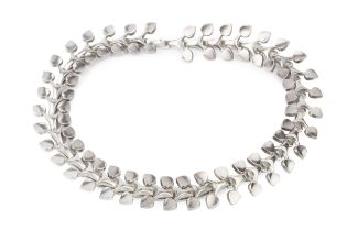 A Swedish silver choker necklace, composed of interlocking stylised twin leaf motif links, maker's