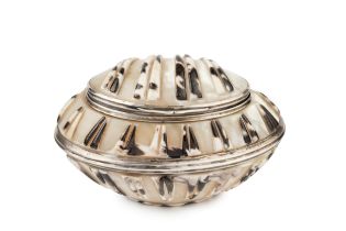 An early 19th century silver mounted shell snuff box, relief carved with bands of decoration,