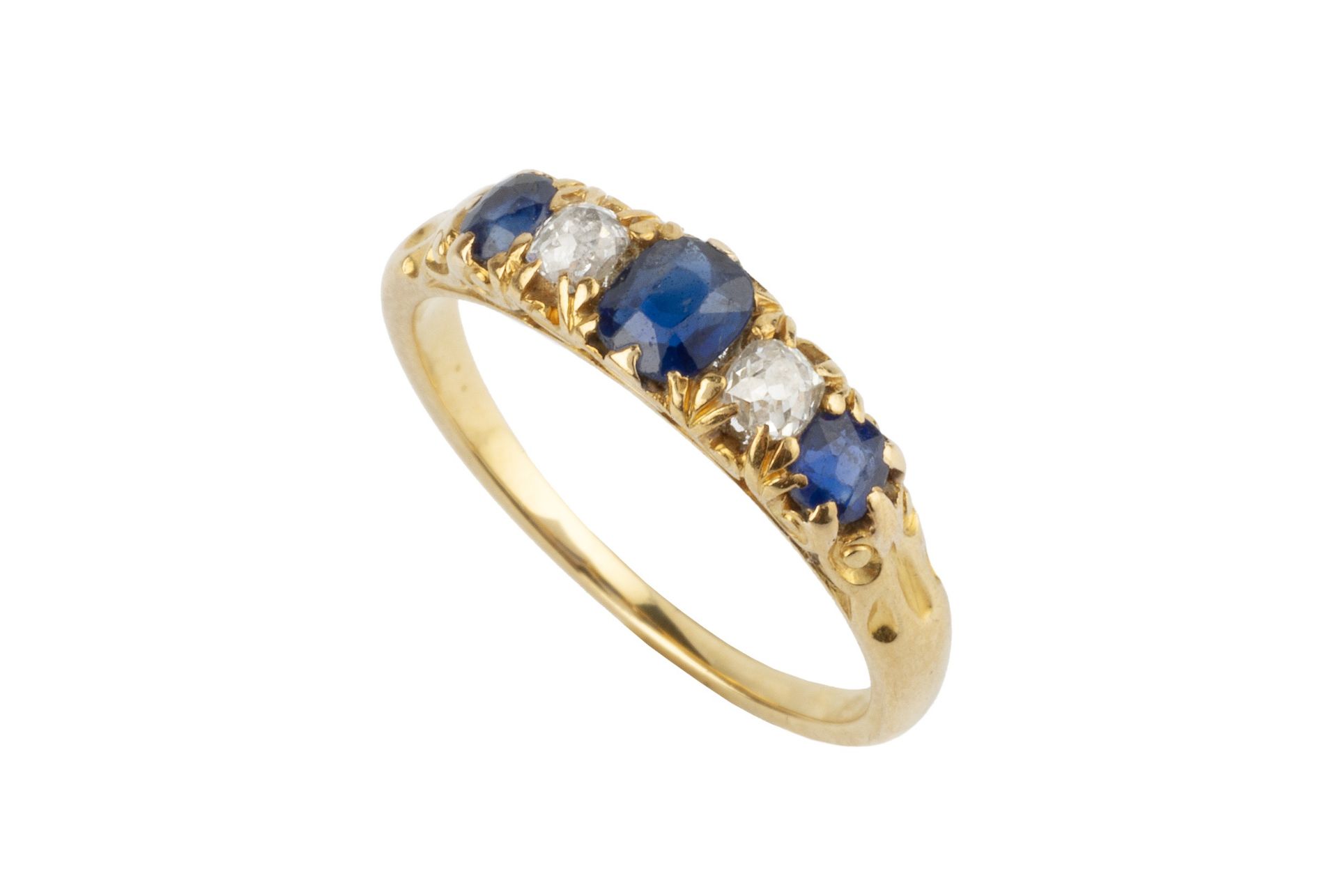 A sapphire and diamond five stone ring, the three graduated circular sapphires flanking two old