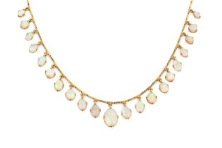 An opal fringe necklace, set with twenty one graduated cabochon oval opals suspended from an
