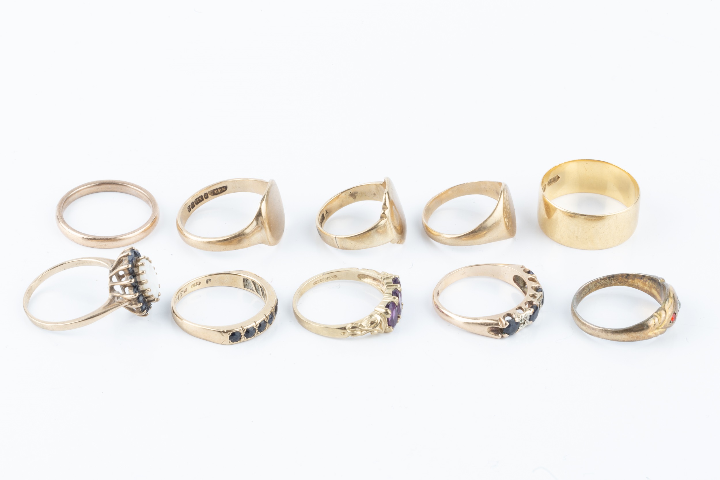 An 18ct gold wedding band, a 9ct gold wedding band, and three 9ct gold signet rings, together with - Image 3 of 3