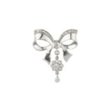 A diamond bow brooch, the stylised ribbon bow edged with graduated old, single and lasque-cut
