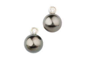 A pair of diamond and black cultured pearl ear studs, each with single collet set diamond mounted