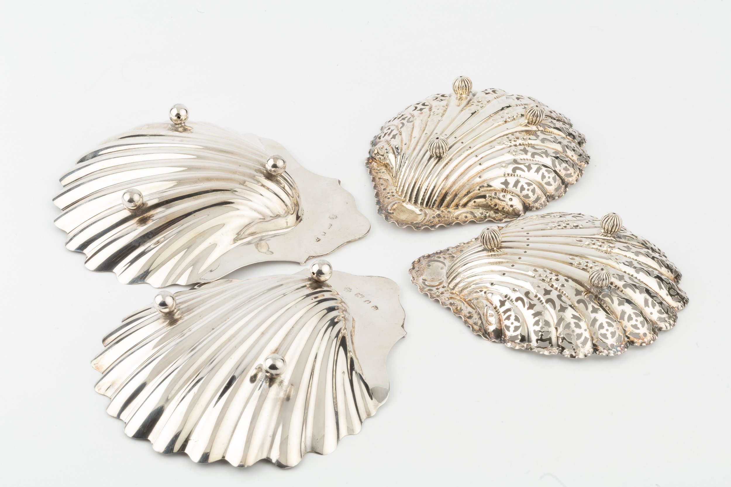 A pair of George III silver scallop shaped butter dishes, on ball feet by Charles Aldridge & Henry - Image 2 of 4