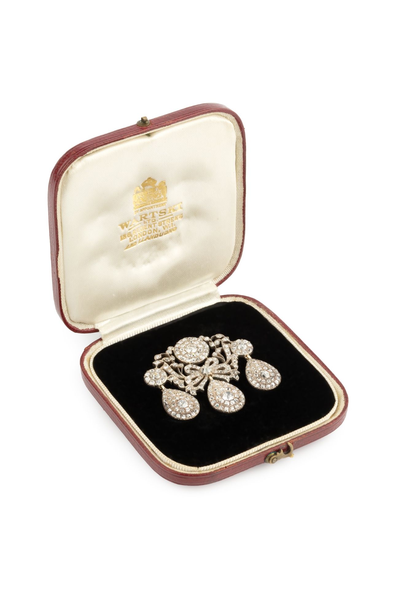 A diamond girandole brooch, formed as a trio of pear-shaped cluster drops suspended from a central