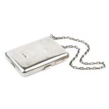 An early 20th century Continental silver rectangular compact and aide memoire, of heavy gauge,