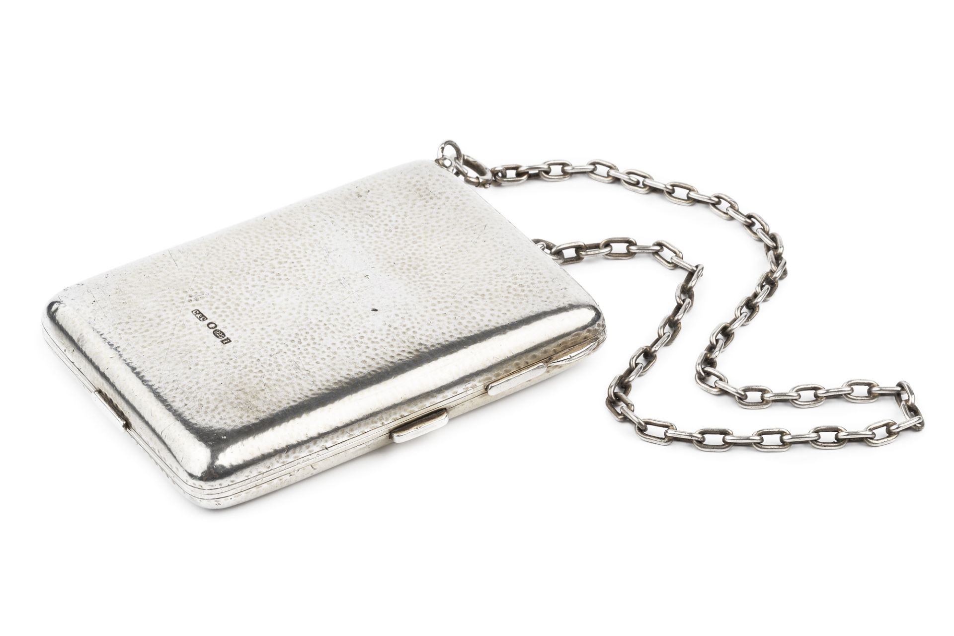 An early 20th century Continental silver rectangular compact and aide memoire, of heavy gauge,