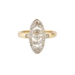 A diamond panel ring, of elongated oval shaped openwork design, centred with a brilliant cut stone