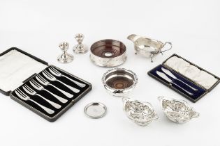 A collection of silver, comprising a pair of late Victorian sweetmeat dishes, of shaped and embossed