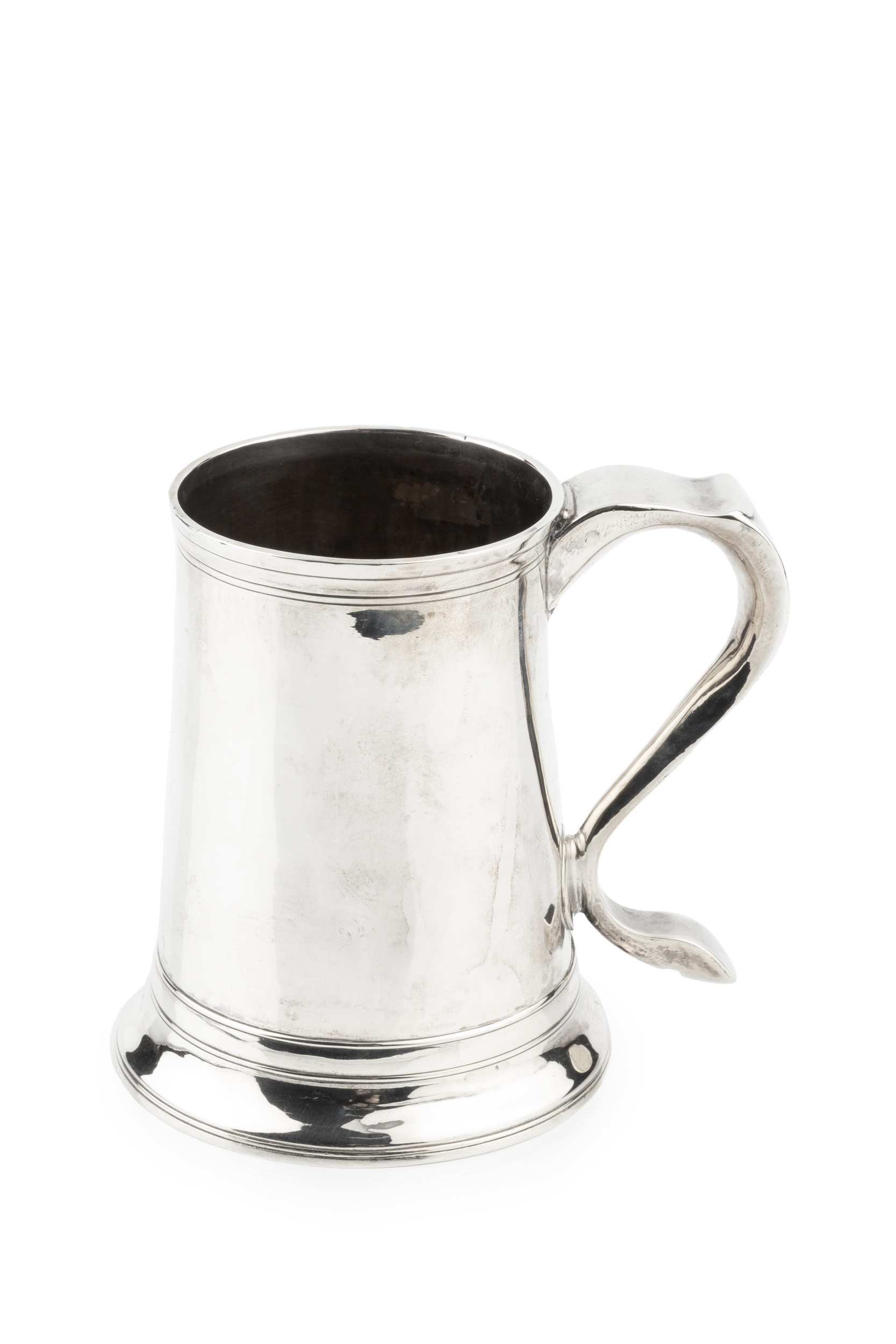 A George III silver pint mug, of plain slightly tapered design, the scroll handle with engraved