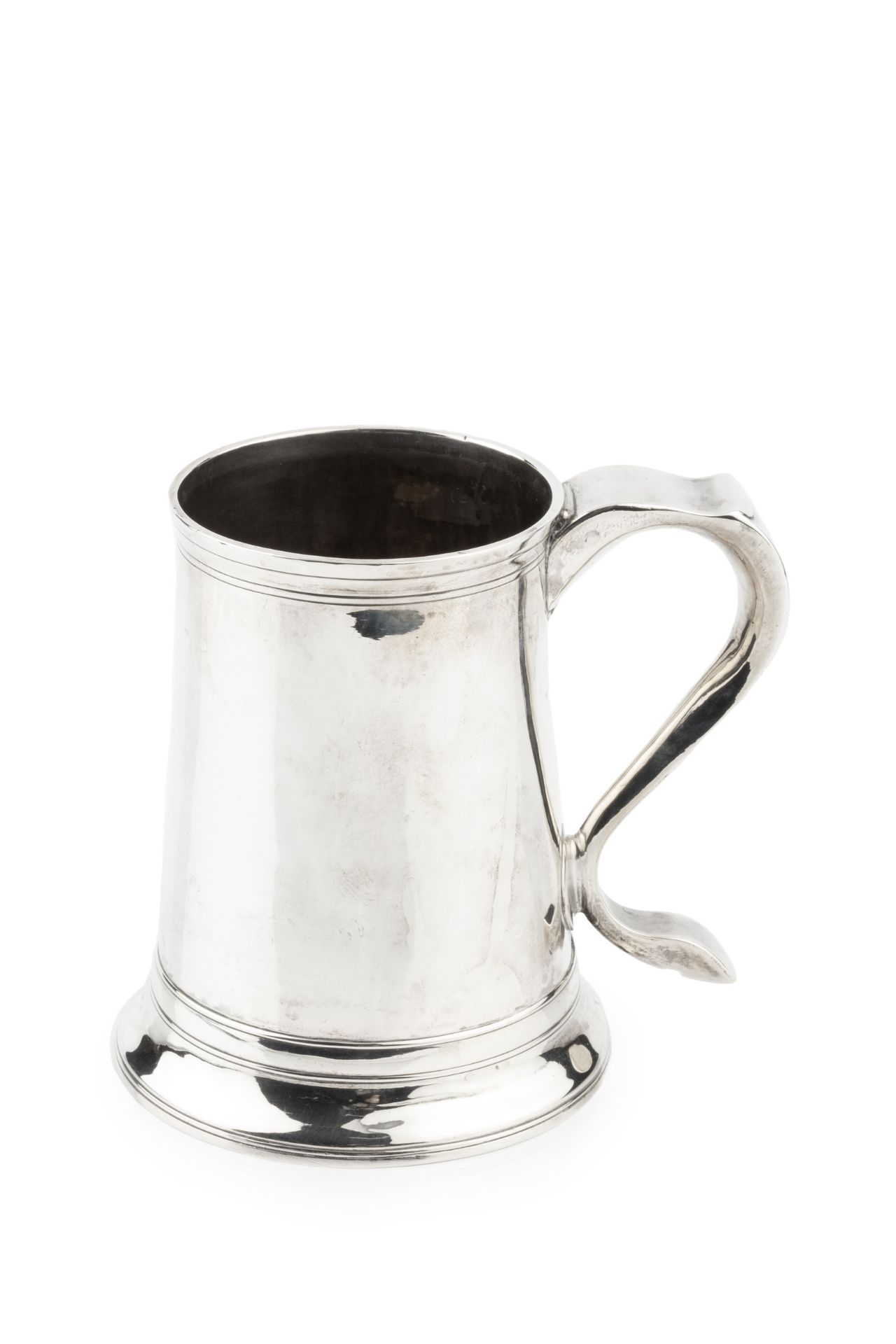 A George III silver pint mug, of plain slightly tapered design, the scroll handle with engraved