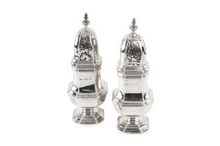 A pair of George V silver sugar castors, of heavy chamfered octagonal baluster form, by Crichton