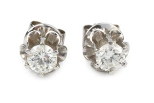 A pair of diamond single stone ear studs, the brilliant cut stones each of approx 0.4ct, claw set in