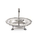 A George II silver oval basket, the shaped border cast with flowering foliage and scrolls and having