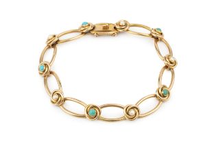 A late Victorian turquoise and seed pearl set bracelet, the open oval yellow precious metal sections