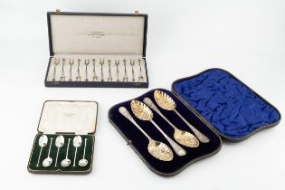 A set of four Edwardian silver berry spoons, by William Hutton & Sons Ltd, London 1902, in fitted