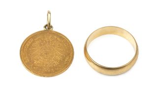 A late 19th century German Prussian 10 mark coin, 1872, and an 18ct gold wedding band. (2) approx