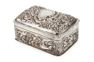 A late Victorian silver cigarette box, with domed hinged top, repoussé decorated with birds, flowers