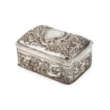 A late Victorian silver cigarette box, with domed hinged top, repoussé decorated with birds, flowers