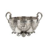 A late 19th/early 20th century Hanau silver lobed bowl, each lobe embossed and engraved with