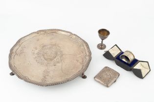 A collection of silver, comprising a George III salver, with shaped and gadrooned border, on pad