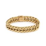 An 18ct gold hollow curb link bracelet, the clasp stamped 750, 18.5cm long Approx weight 30.1g