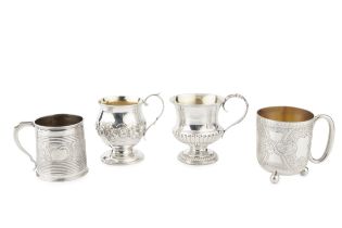 A George IV silver christening cup, of reeded and part lobed urn form, with foliate cast scroll