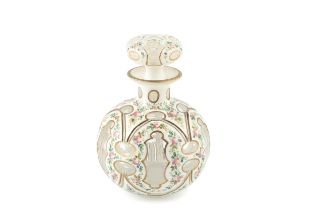 A Victorian white overlaid cut glass scent bottle and stopper, of globular form, the gilt edged