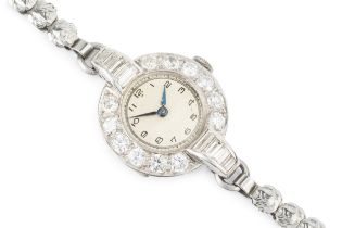 A diamond cocktail watch, the circular bezel set with twelve round brilliant cut diamonds, and