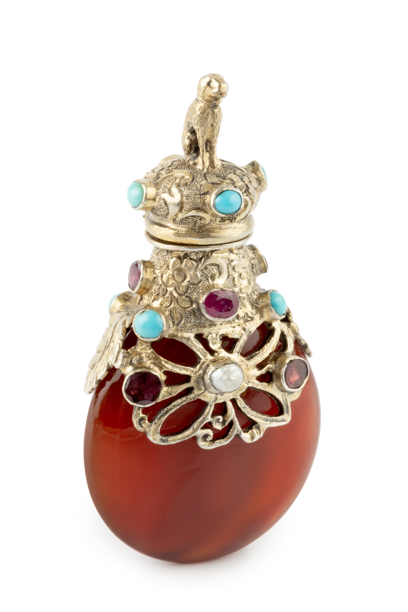 A 19th century silver-gilt mounted agate scent bottle, the pierced and engraved mounts and hinged