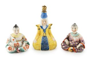 A late 19th century Continental porcelain novelty scent bottle, modelled as a seated Chinaman, his