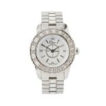 A lady's steel and diamond 'Christal' wristwatch by Christian Dior, with white circular dial, the