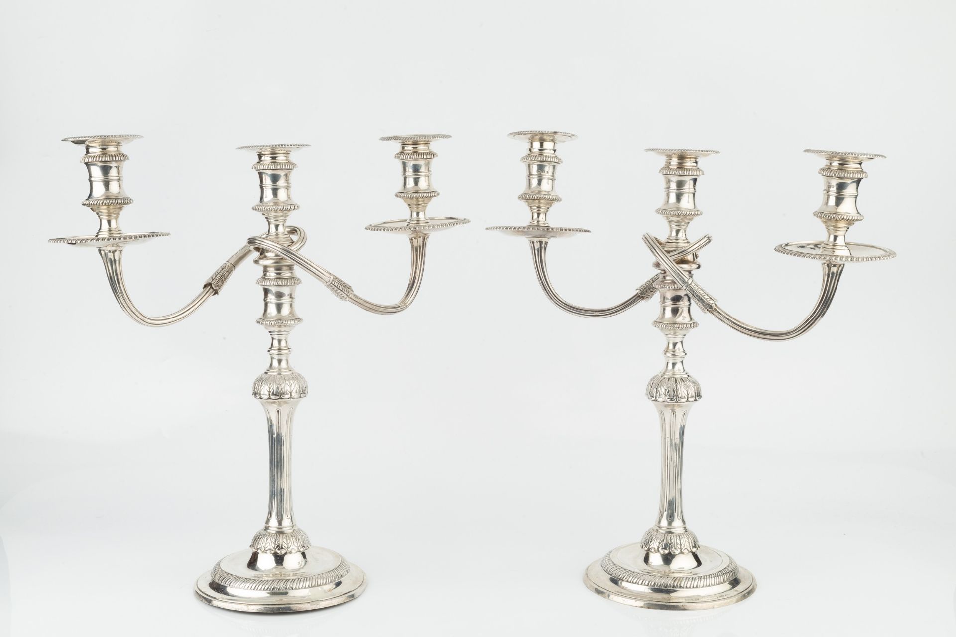 A pair of silver three light candelabra, the detachable branches with reeded arms and gadrooned drip - Image 2 of 3