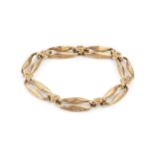 A 9ct gold bracelet, formed of shaped and textured elongated oval links with cluster spacers