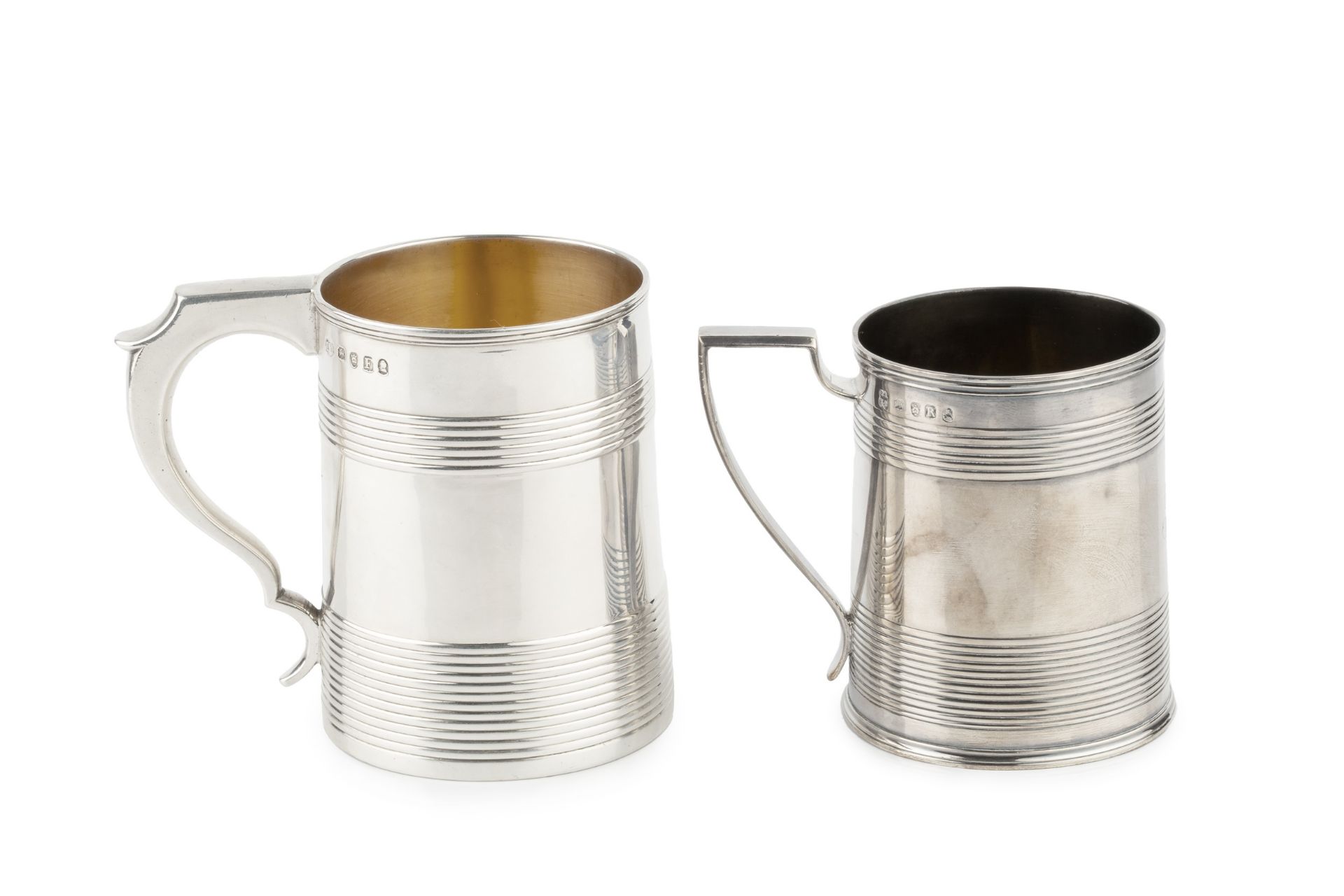 A George III silver christening mug, of slightly tapered form with bands of reeded decoration,