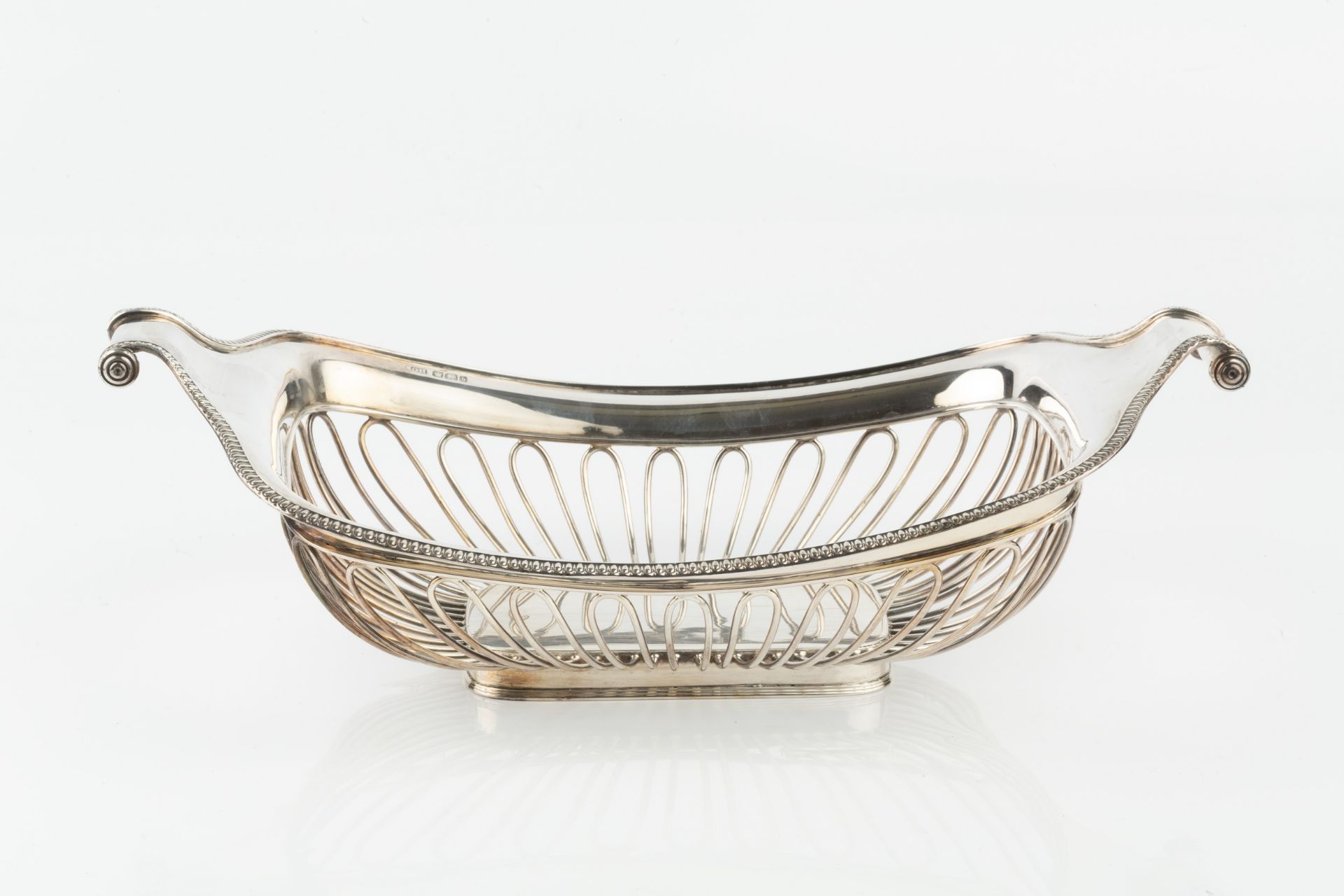 A late Victorian silver cake basket, of rounded rectangular form with scroll ends, having - Image 3 of 3