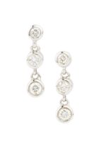 A pair of 18ct white gold and diamond earrings, each with three collet-set brilliant cut stones