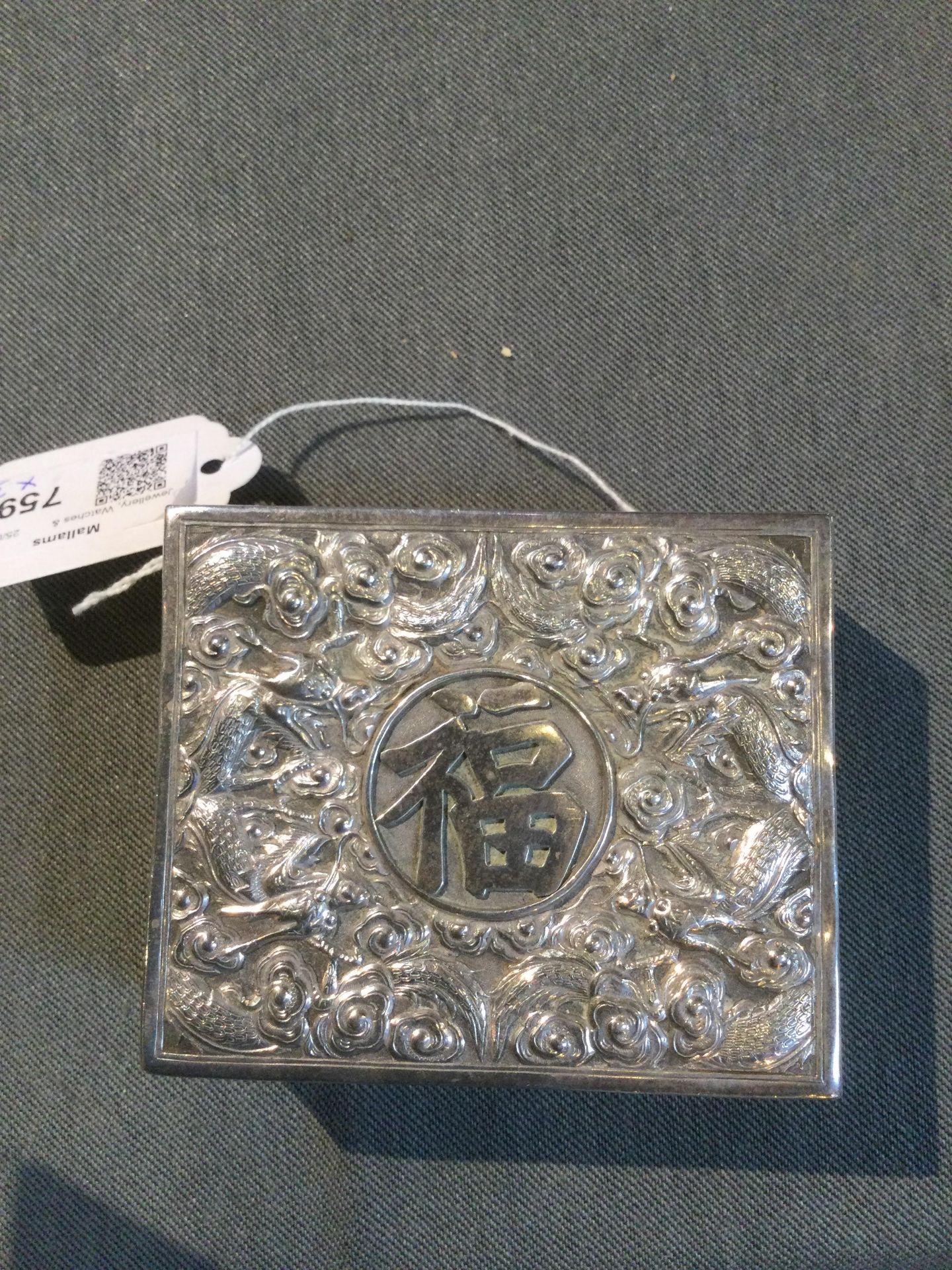 A Chinese silver rectangular box, with hinged cover, embossed and engraved with dragons amidst - Image 9 of 10