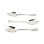 A Queen Anne silver Hanoverian pattern tablespoon, maker's mark indistinct, London 1710, and two