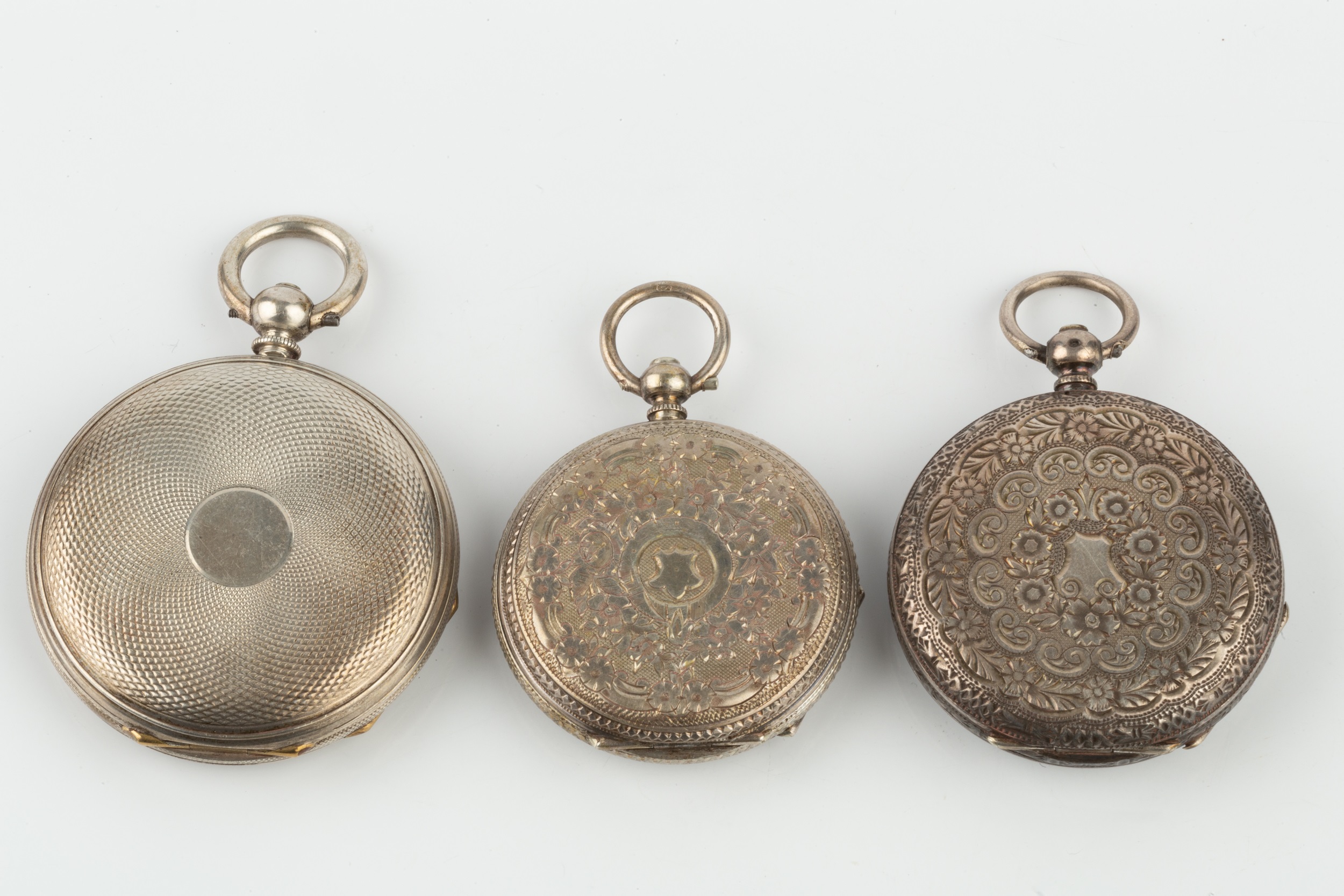 A silver hunter pocket watch, with engine turned decoration to both sides, the gilt heightened white - Image 2 of 2