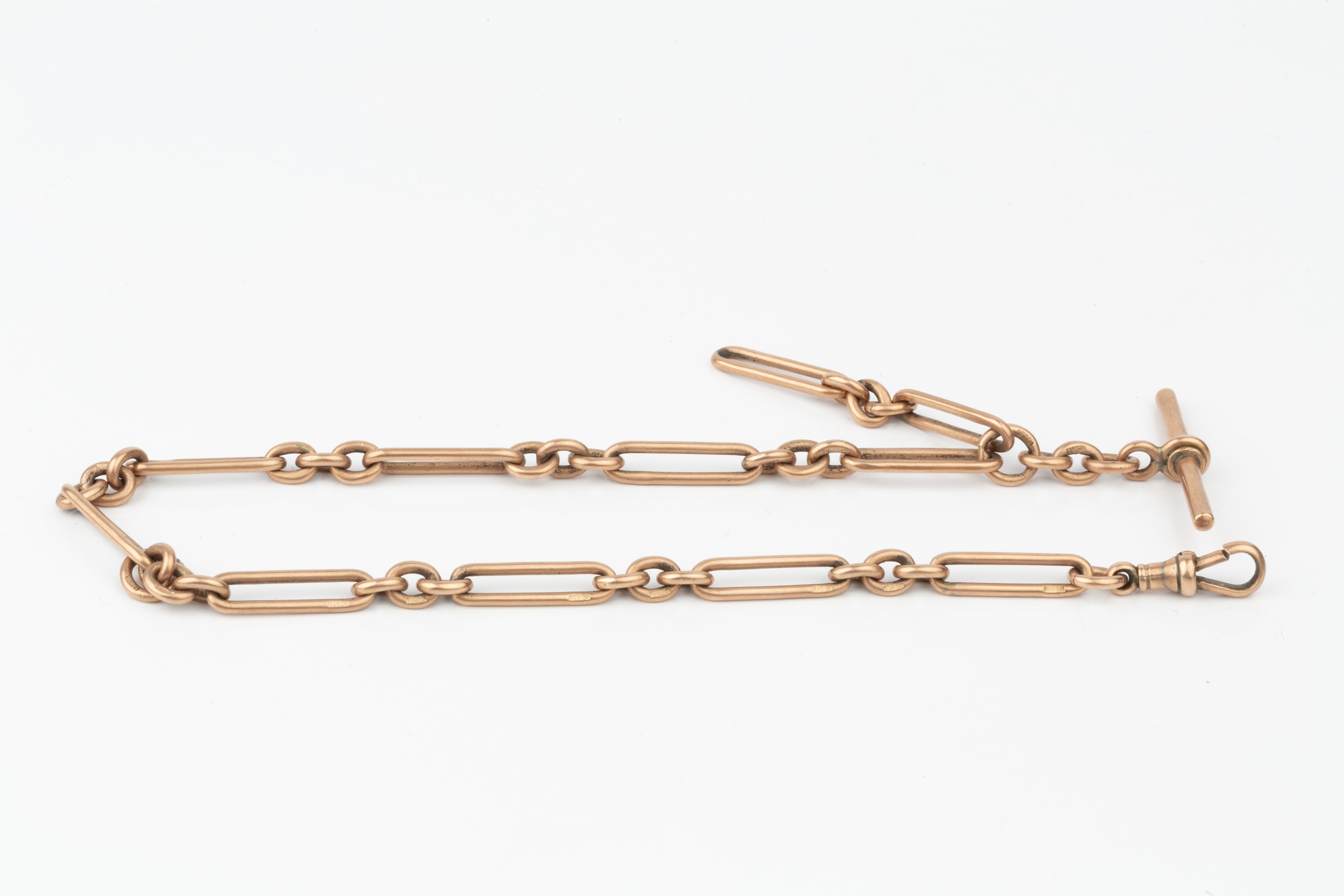 A 9ct gold albert chain, with elongated open links and T-bar, 34cm long approx weight 30.3g. The - Image 2 of 2
